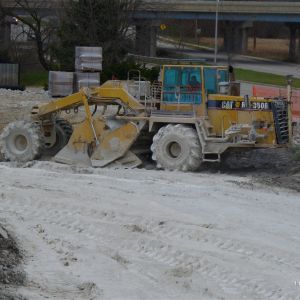 Lime being mixed with soil to add strength to the soil