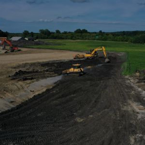 Re-spreading topsoil in non-structural areas